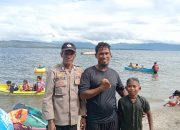 Bhabinkamtibmas Polsek Balige Berikan Imbauan Kamtibmas di Obyek Wisata Pantai Bulbul