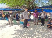 Bhabinkamtibmas Lakukan Patroli Sambang ke Tempat Wisata Pantai Lumban Bul Bul Balige